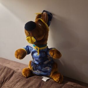 Plush Dog Toy in Blue Wizard Outfit